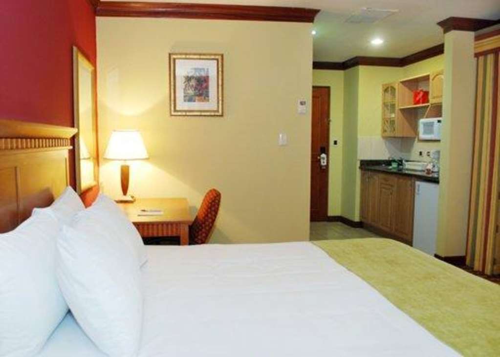 Suites Las Palmas, Hotel & Apartments. サンサルバドル 部屋 写真