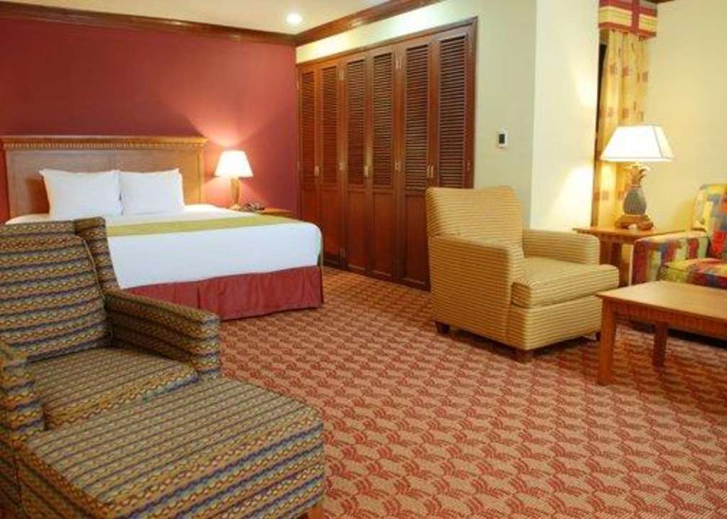 Suites Las Palmas, Hotel & Apartments. サンサルバドル 部屋 写真