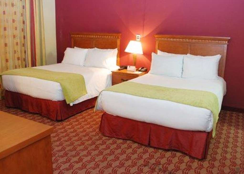 Suites Las Palmas, Hotel & Apartments. サンサルバドル 部屋 写真