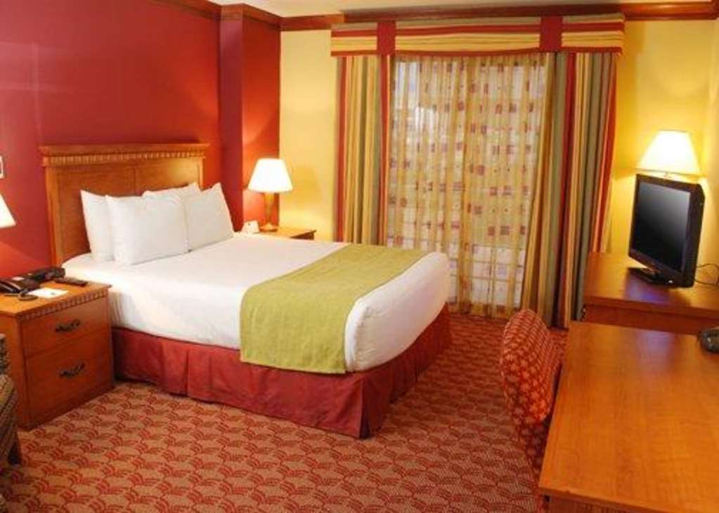 Suites Las Palmas, Hotel & Apartments. サンサルバドル 部屋 写真