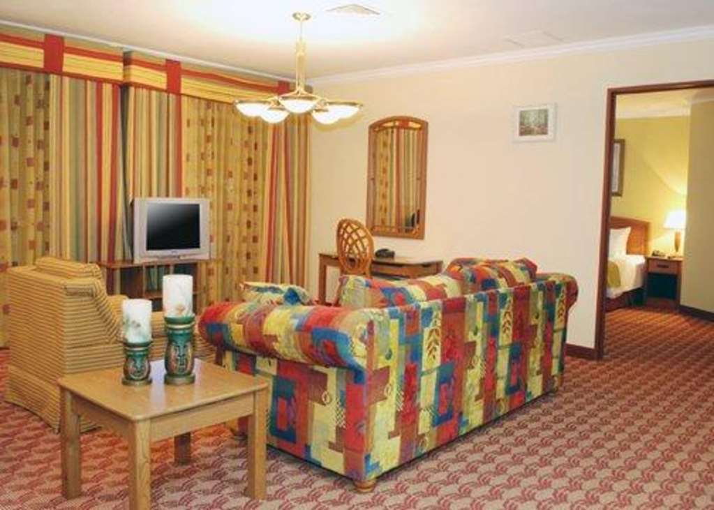 Suites Las Palmas, Hotel & Apartments. サンサルバドル 部屋 写真